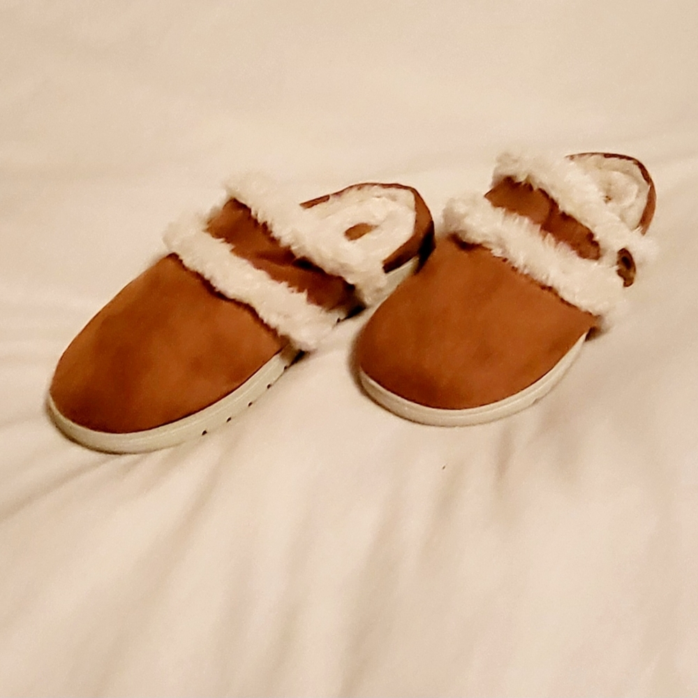 Tan, furry, cozy slip-on comfort.